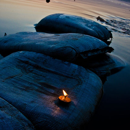 Diya at Kesi Ghat, Varanasi 2010, Udit Kulshrestha, Wonderwall - Artisera