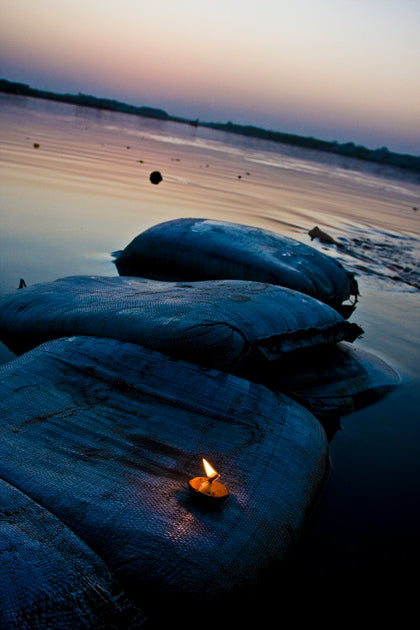 Diya at Kesi Ghat, Varanasi 2010, Udit Kulshrestha, Wonderwall - Artisera